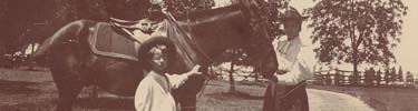 Theodore Roosevelt Junior and Alice Roosevelt, the two oldest children of the president, pose near their home.